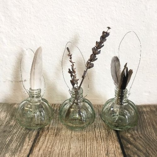 Tiny decorative glass bottles